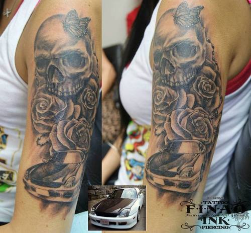 Grey Skull With Rose Flowers And Car Tattoo On Sleeve