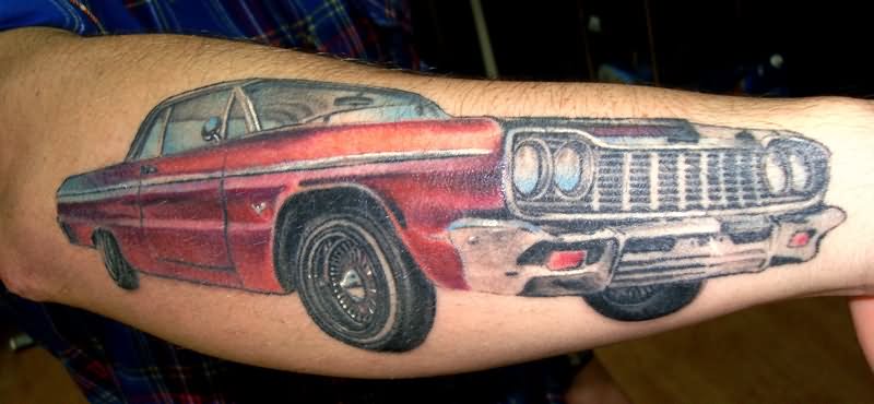Guy Showing His Right Arm Car Tattoo