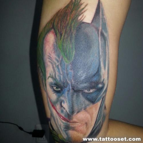 Half Batman Face And Half Joker Face Tattoo On Half Sleeve
