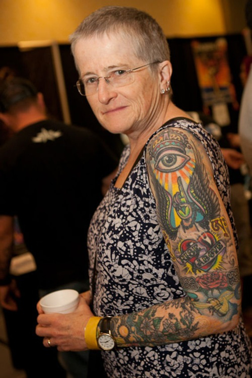 Heart With Banner And Eye Tattoo On Old People Left Sleeve