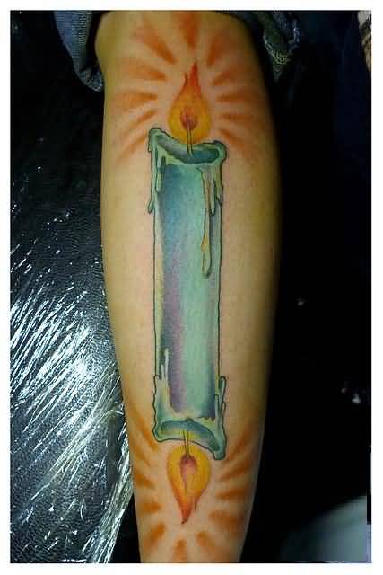 Illuminating Candle Burning At Both Ends Tattoo on Arm