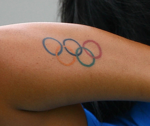 Latest Colorful Olympic Symbol Tattoo Design For Arm