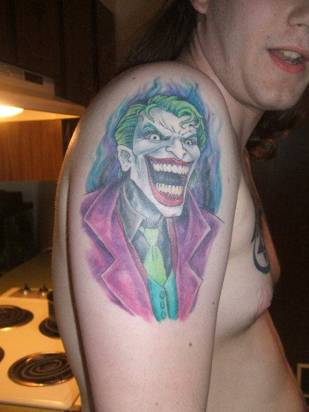 Laughing Joker Tattoo On Man Right Shoulder
