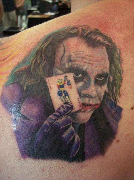 Left Back Shoulder Joker With Card Tattoo
