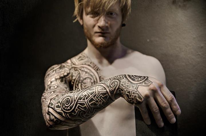 Man With Right Sleeve Scandinavian Tattoo