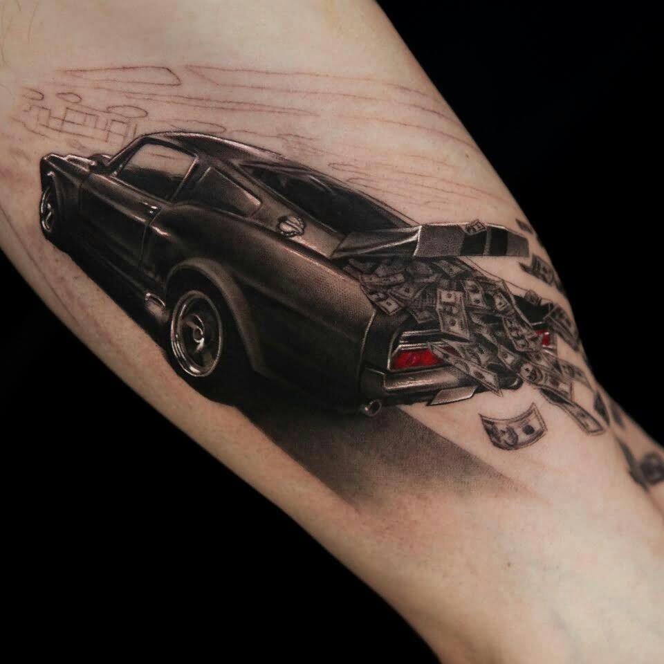 Money Flying From Car Tattoo On Arm