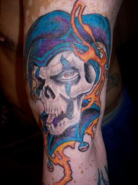 Morose Joker Tattoo On Left Arm