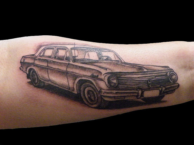 Nice Grey Car Tattoo On Arm