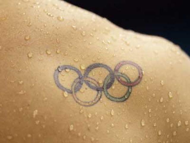 Olympic Symbol Tattoo On Right Back Shoulder