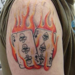 Playing Cards In Fire And Flame Tattoo Design For Shoulder