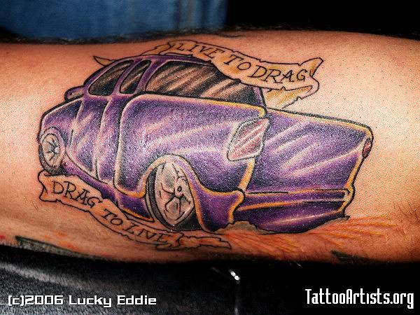 Purple Ink Car Tattoo On Left Arm