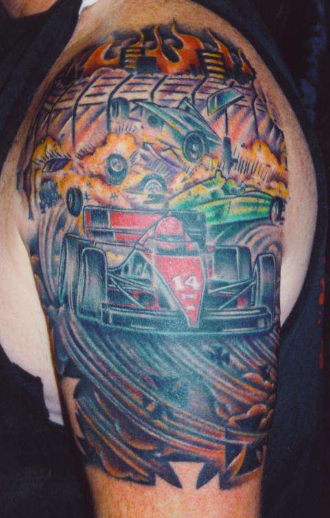Racing Car Tattoo On Left Sleeve