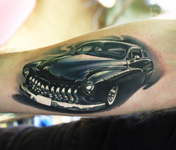 Realistic Car Tattoo On Arm by Sergey Shanko