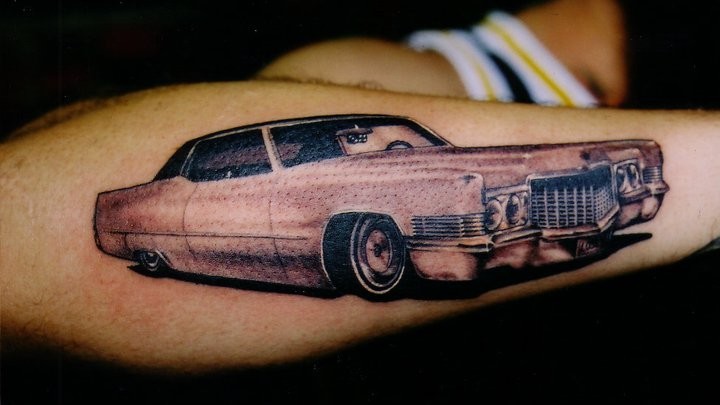 Realistic Downride Car Tattoo On Right Arm