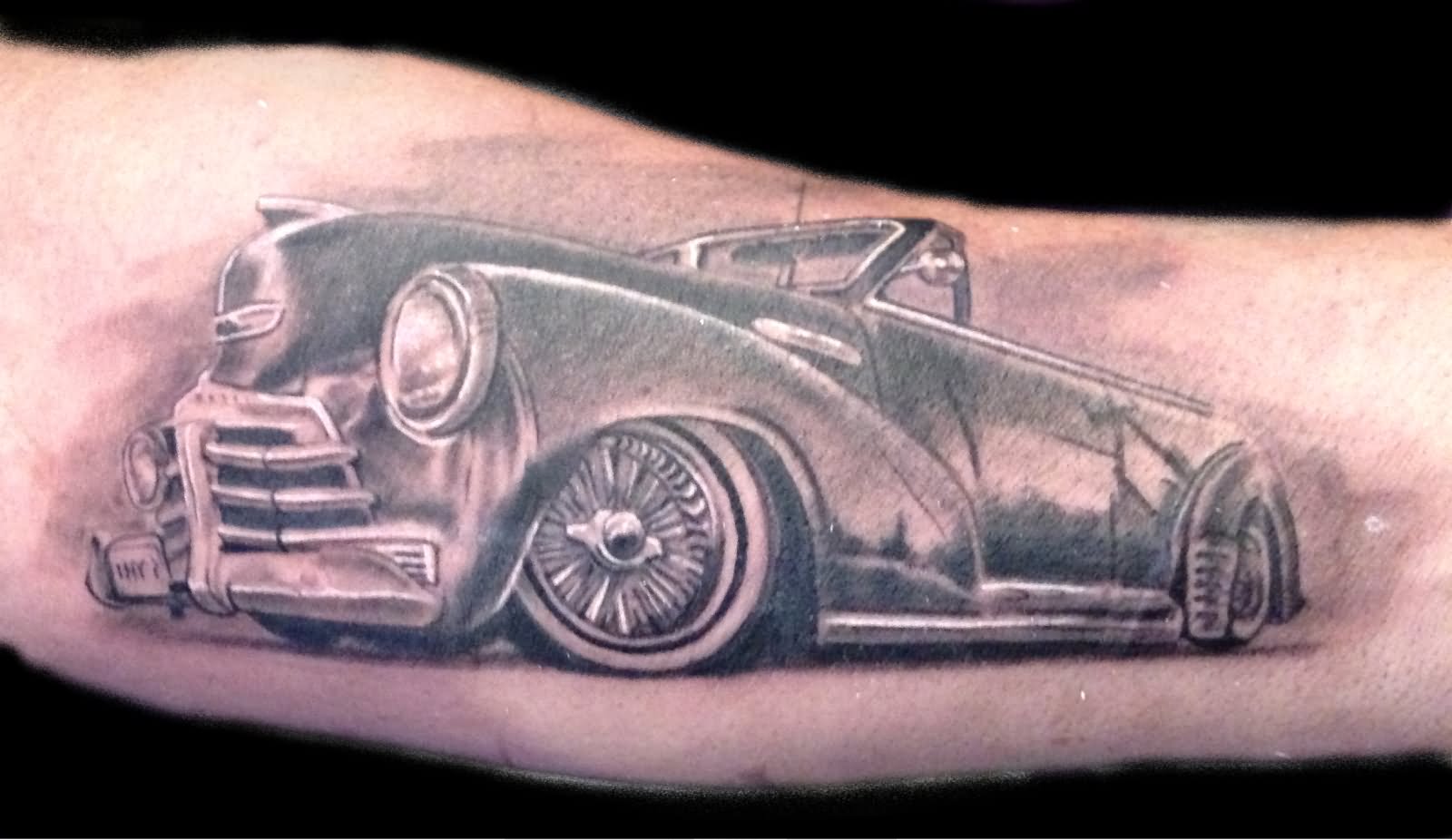 Realistic Grey Car Tattoo On Forearm