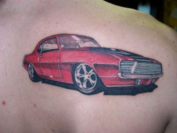 Red Car Tattoo On Right Back Shoulder
