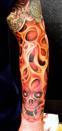 Red Fire And Flame Tattoo On Left Forearm