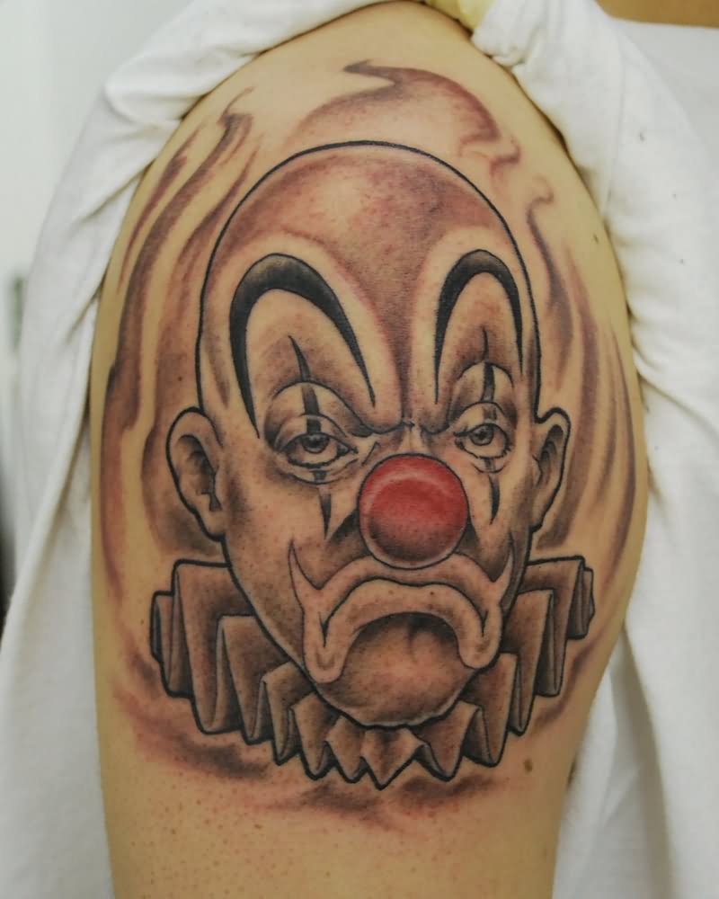 Red Nose Sad Joker Tattoo On Left Shoulder
