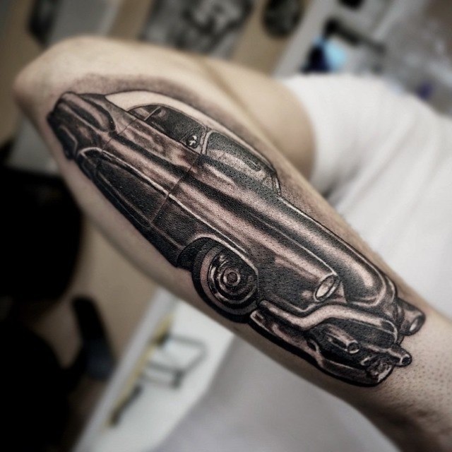 Right Forearm Grey Car Tattoo by Baraka Tattoo
