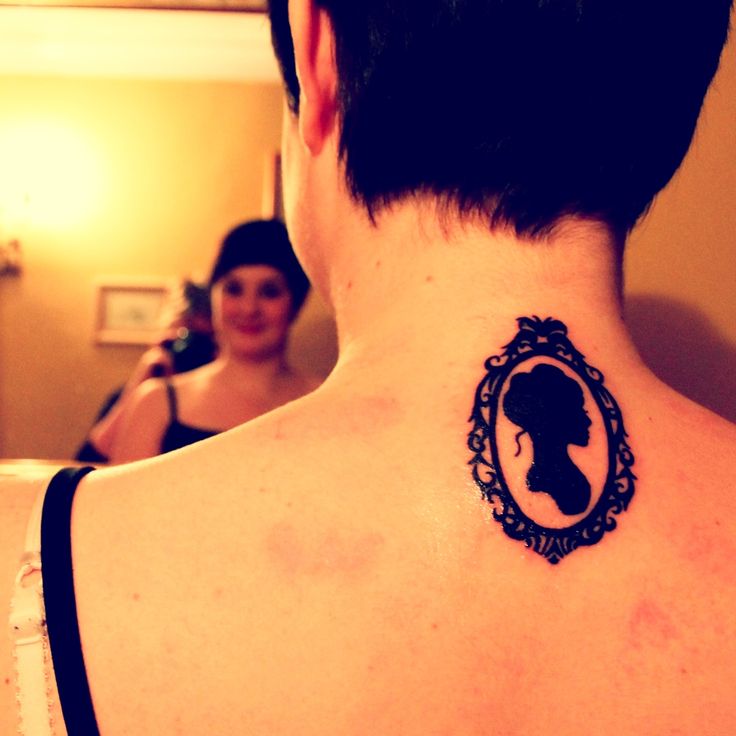 Silhouette Girl Portrait Tattoo On Upper Back