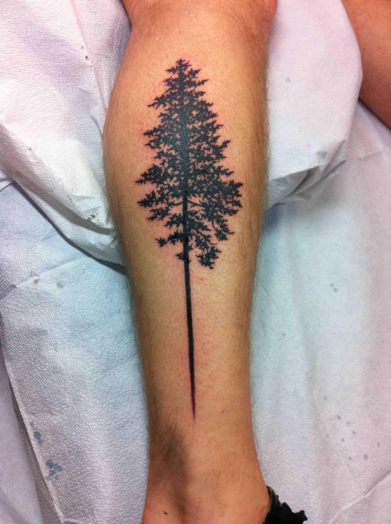 Silhouette Tree Tattoo On Leg by Sadie Kennedy