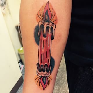 Simple candle burning at both ends tattoo