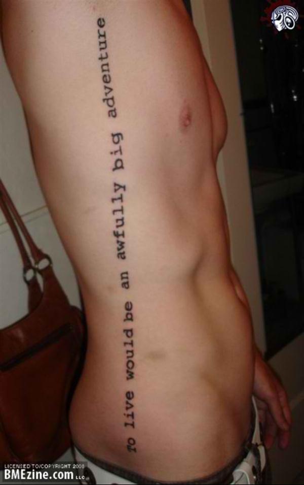 Simple Feminine Quote Tattoo On Man Right Side Rib
