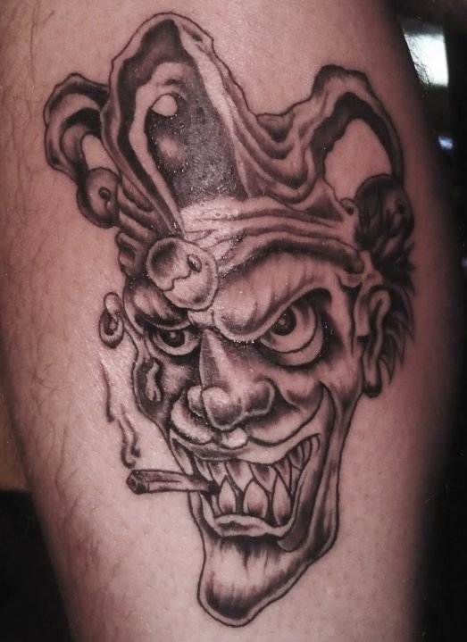 Smoking Jester Joker Tattoo On Leg