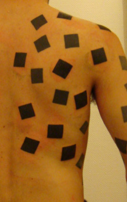 Square Tattoos On Right Back Shoulder