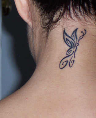 Tribal Feminine Butterfly Tattoo On Girl Back Neck