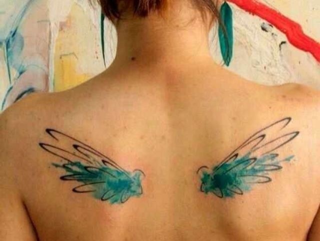 Watercolor Feminine Tattoo On Girl Upper Back