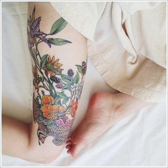 Amazing Colorful Flowers Tattoo On Right Upper Leg