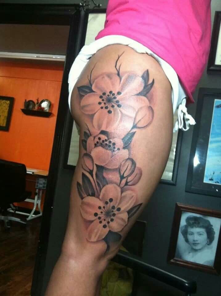 Amazing Grey Ink Flowers Tattoo On Right Upper Leg