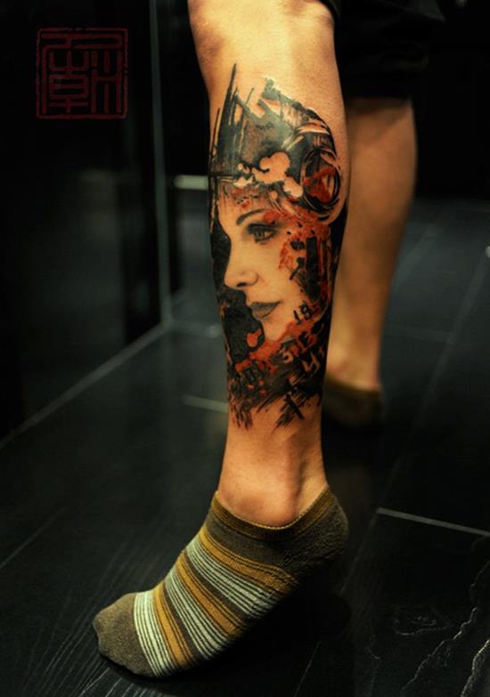 Attractive Girl Face Tattoo On Left Leg