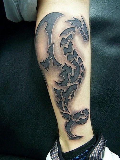 Awesome Black Tribal Dragon Tattoo On Leg