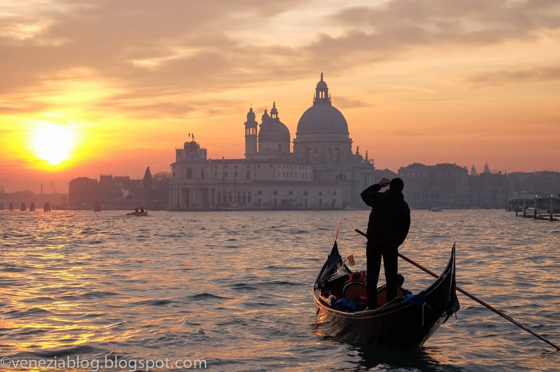 Beautiful Picture Of Santa Maria della Salute And Gondola During Sunset In Venice