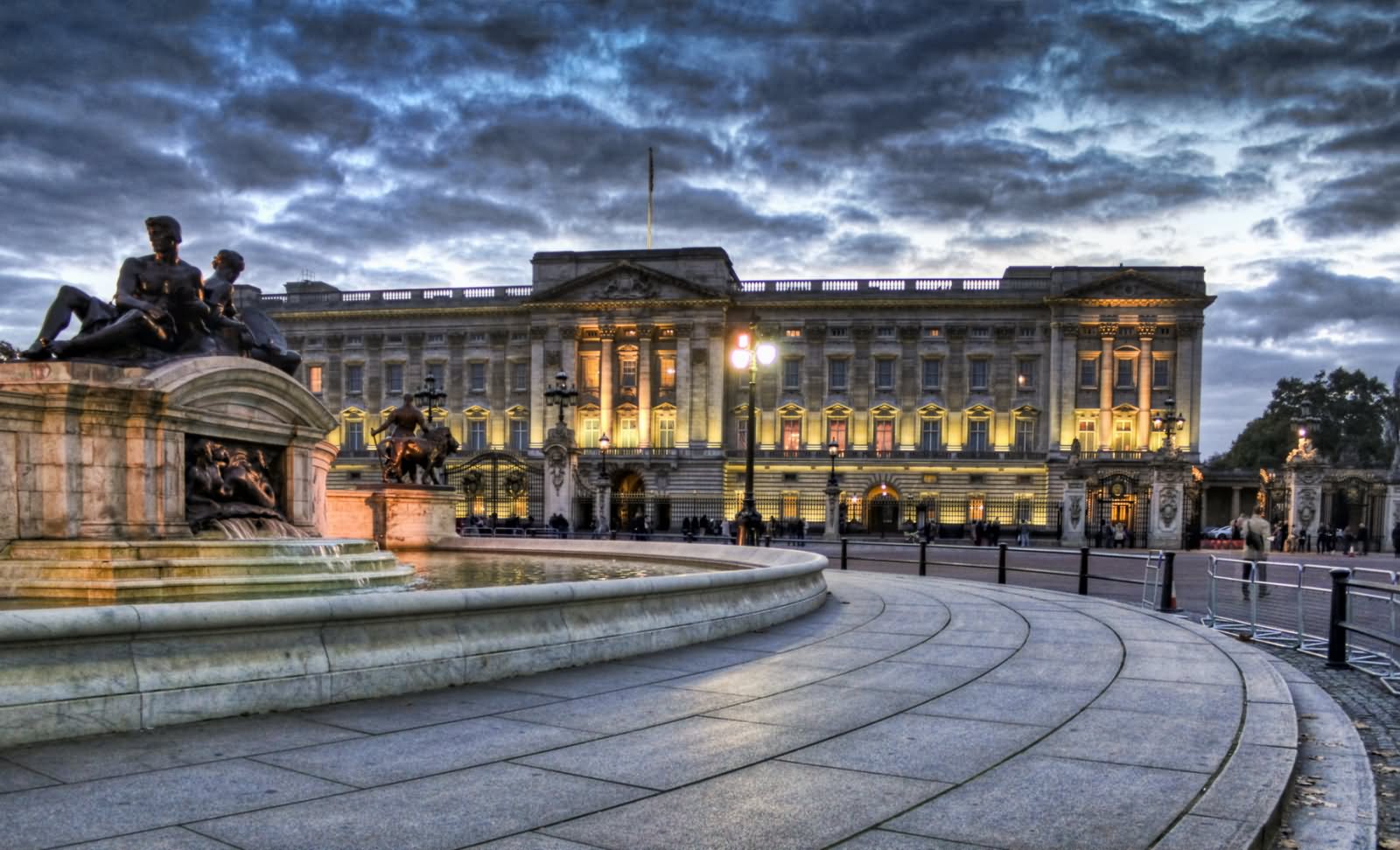 Beautiful View Of The Buckingham Palace With Black Clouds