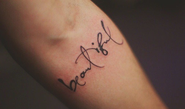 Beautiful Word Tattoo On Forearm