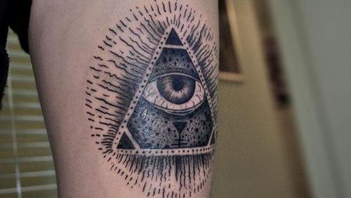 Black And Grey Eye In Triangle Tattoo Design For Thigh