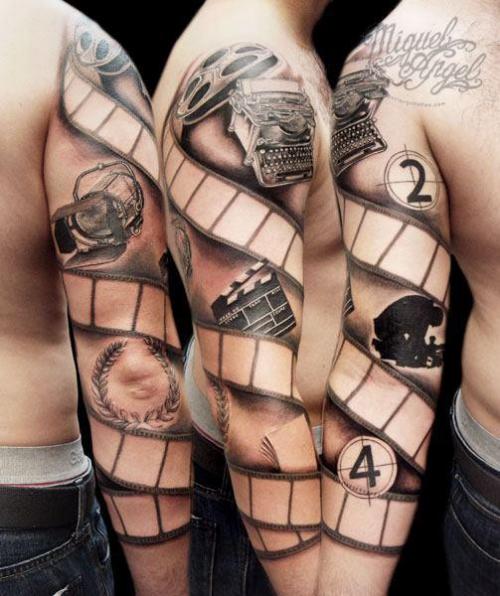 Black And Grey Ink Cinema Tattoo On Full Sleeve