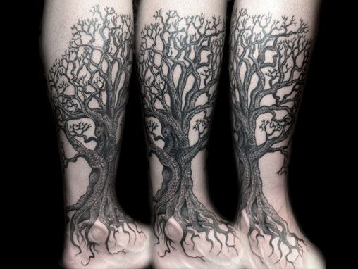 Black And Grey Tree Tattoo On Leg