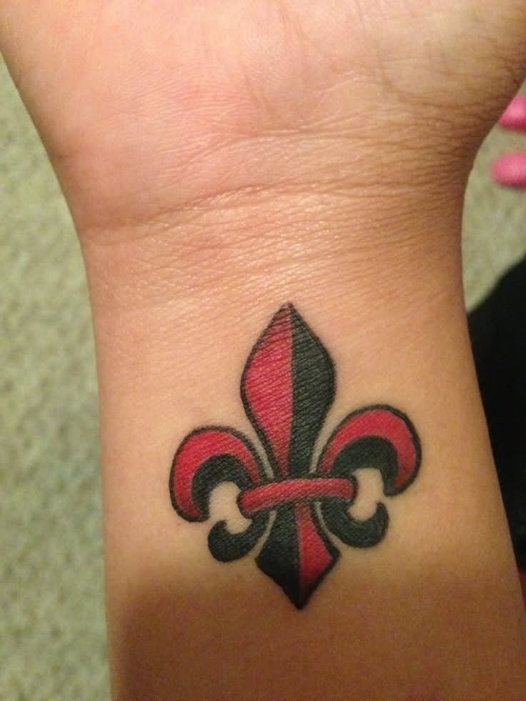 Black And Red Ink Fleur De Lis Tattoo On Wrist