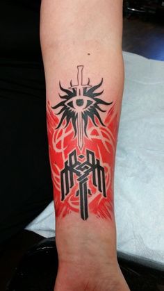Black And Red Ink Video Game Tattoo On Left Forearm