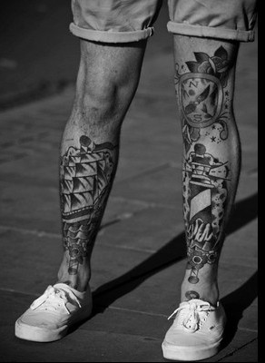 Black And White Ship Tattoo On Both Leg