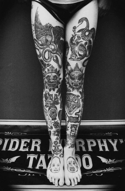 Black And White Traditional Tattoo On Girl Both Full Leg