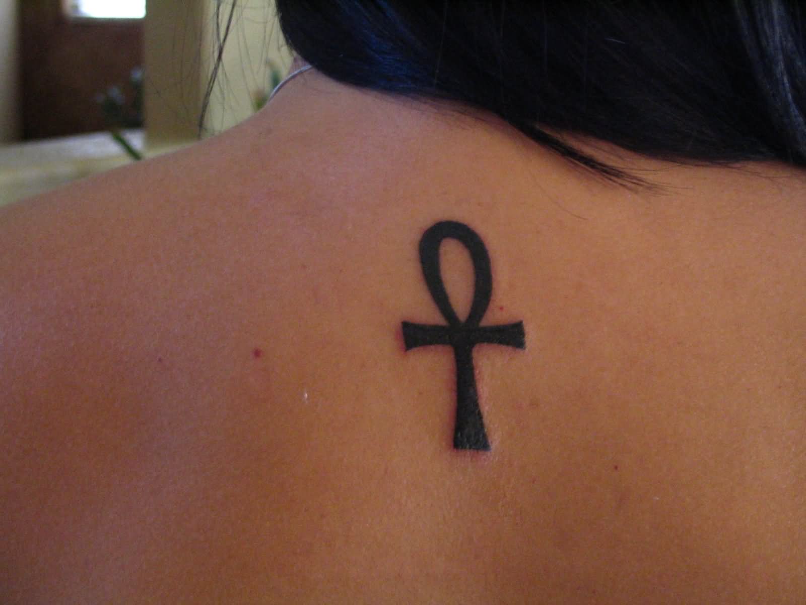 Black Ankh Egyptian Tattoo On Upper Back