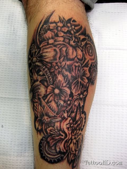 Black Ink Flowers Tattoo On Leg Calf