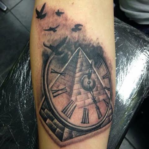 Black Ink Pyramid Clock Tattoo Design For Forearm