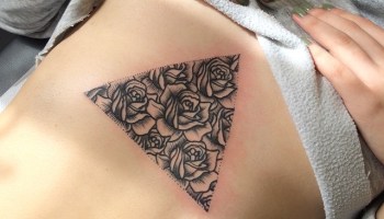 Black Ink Roses In Triangle Tattoo Design
