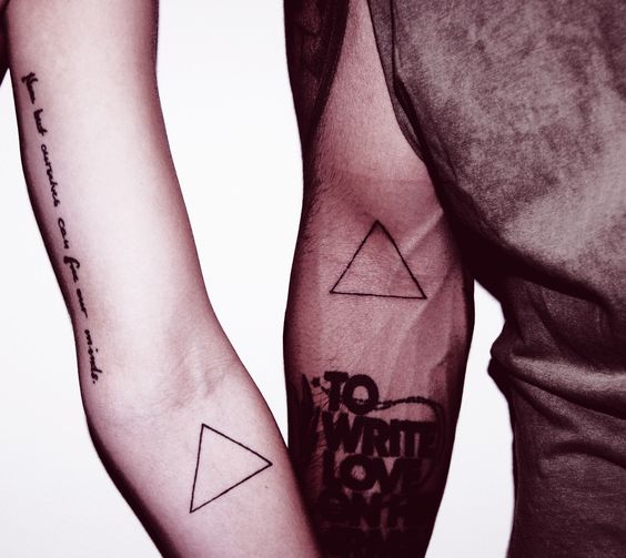 Black Outline Triangle Tattoo On Couple Arm